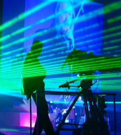 Laser show on performance of musical group (C) Shutterstock, Vasily Smirnov